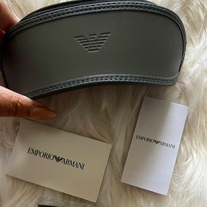 Sunglass case. Never used. Color: Dark grey